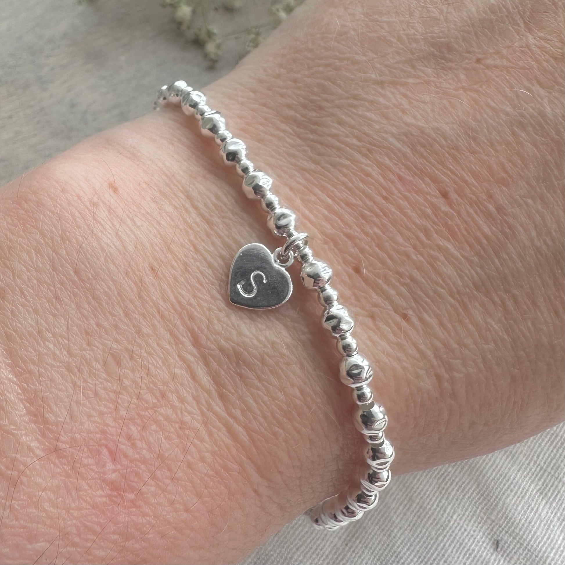 Stretchy Textured Bead Initial Bracelet, Personalised Layering Sterling Silver bracelet with textured beads and letter heart