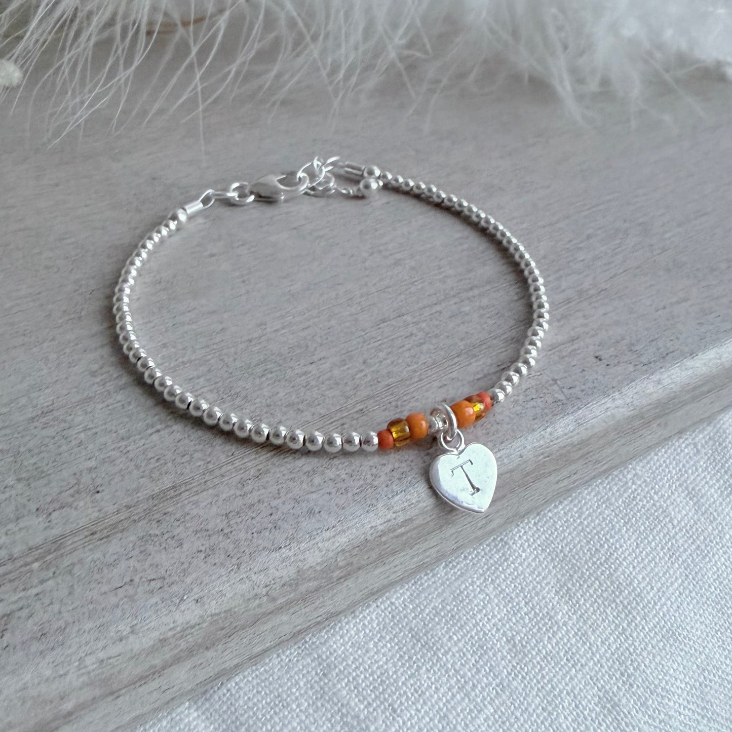 Ups N Downs Charity Bracelets Silver & Orange