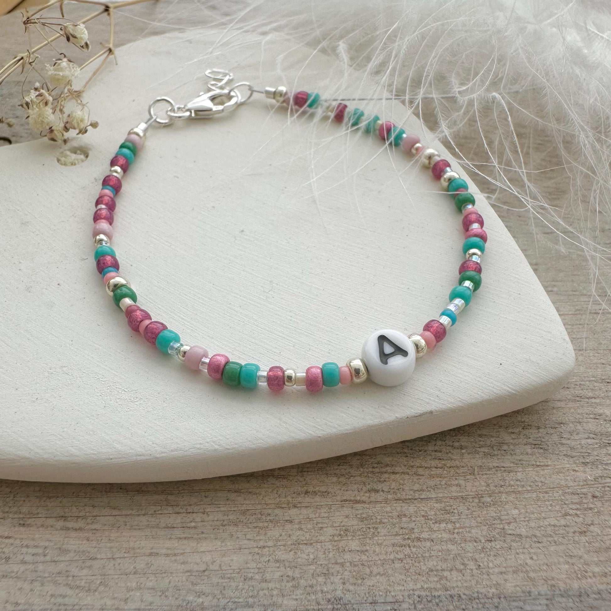 Beaded initial bracelet with personalised glass bead, colourful initial jewellery with seed beads