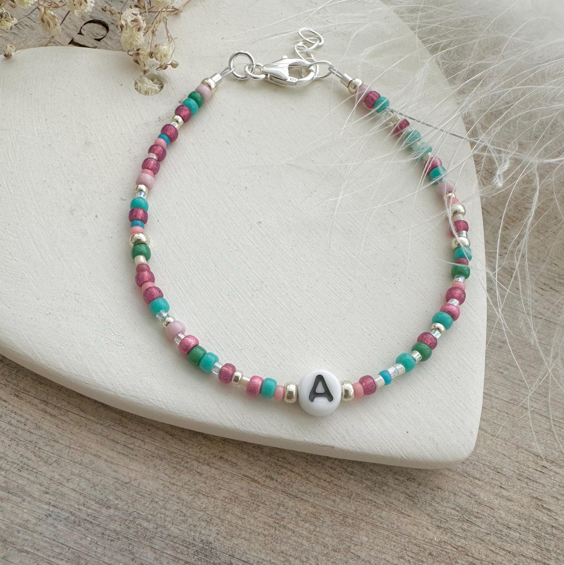 Beaded initial bracelet with personalised glass bead, colourful initial jewellery with seed beads