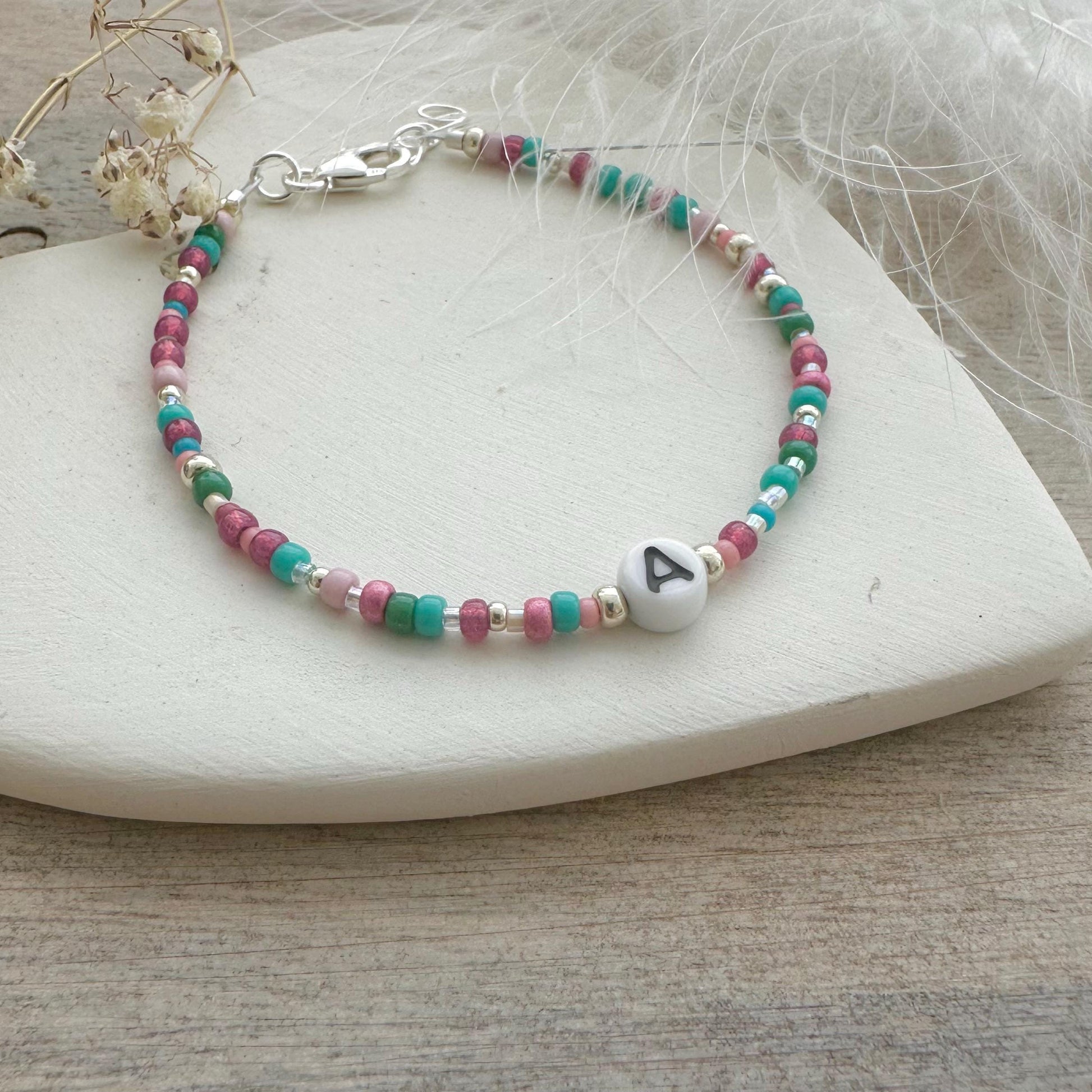 Beaded initial bracelet with personalised glass bead, colourful initial jewellery with seed beads