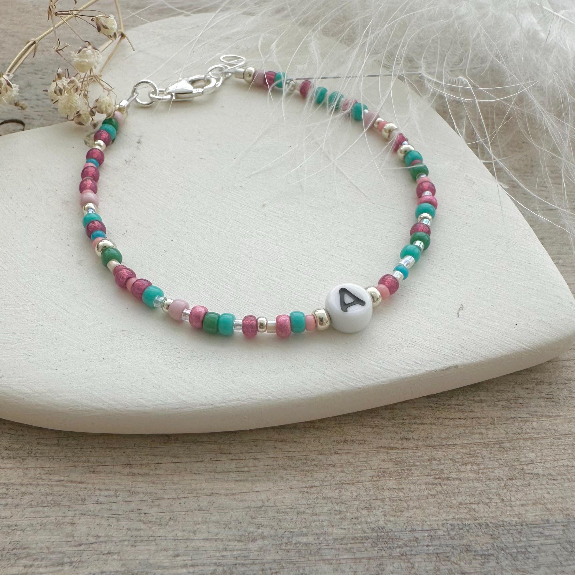 Beaded initial bracelet with personalised glass bead, colourful initial jewellery with seed beads