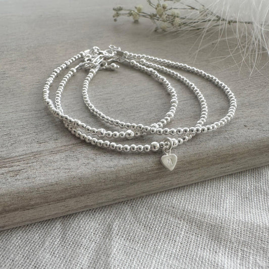 Personalised Silver Stacking Bracelet Set, Sterling Silver Family Initial Layering Bracelets