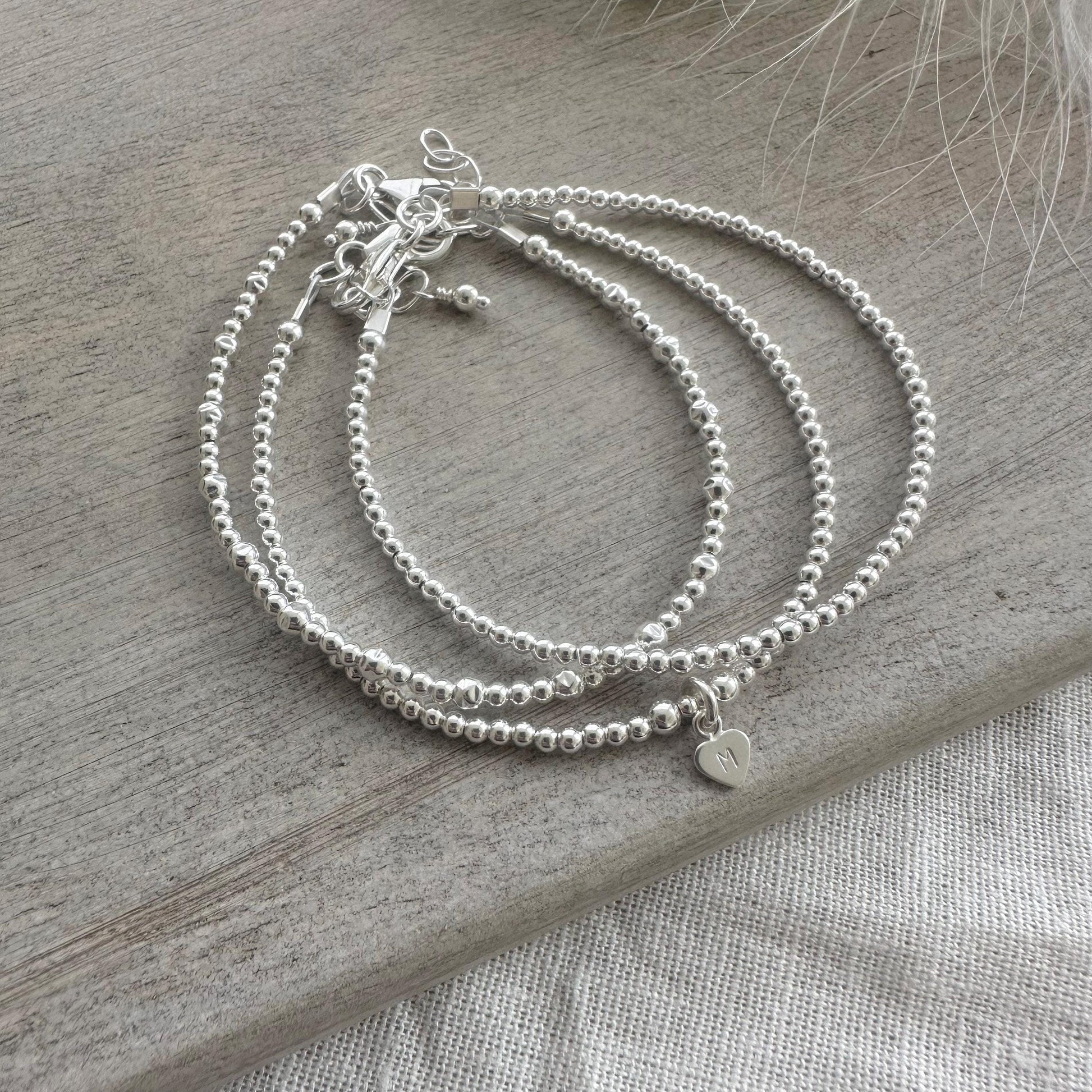 Personalised Silver Stacking Bracelet Set, Sterling Silver Family Initial Layering Bracelets