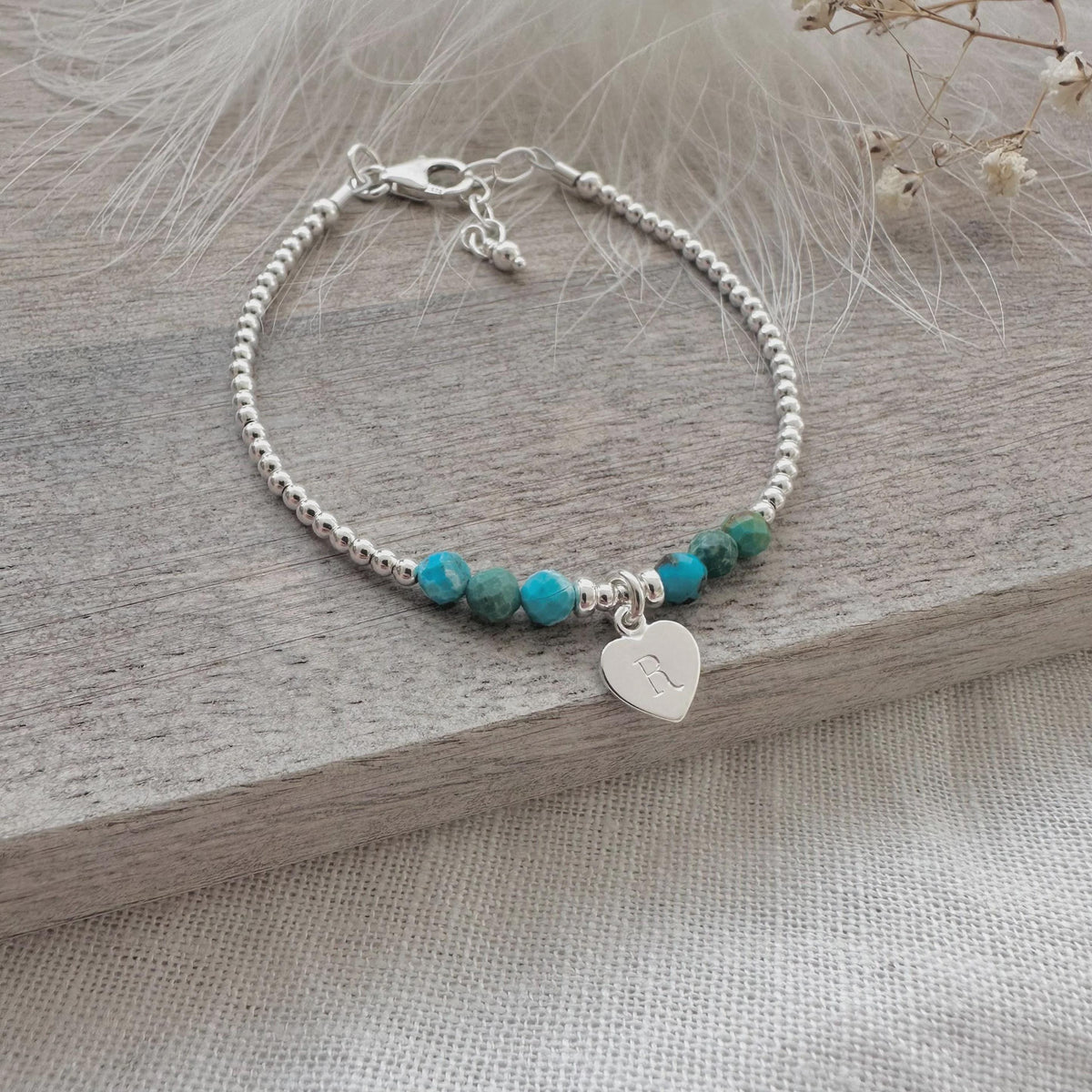 Birthstone initial bracelet in sterling silver and gemstone